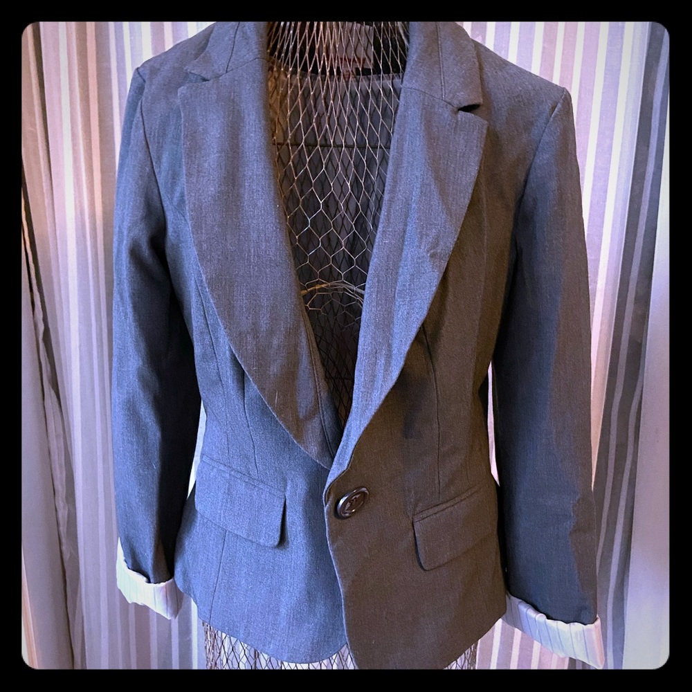Grey blazer.